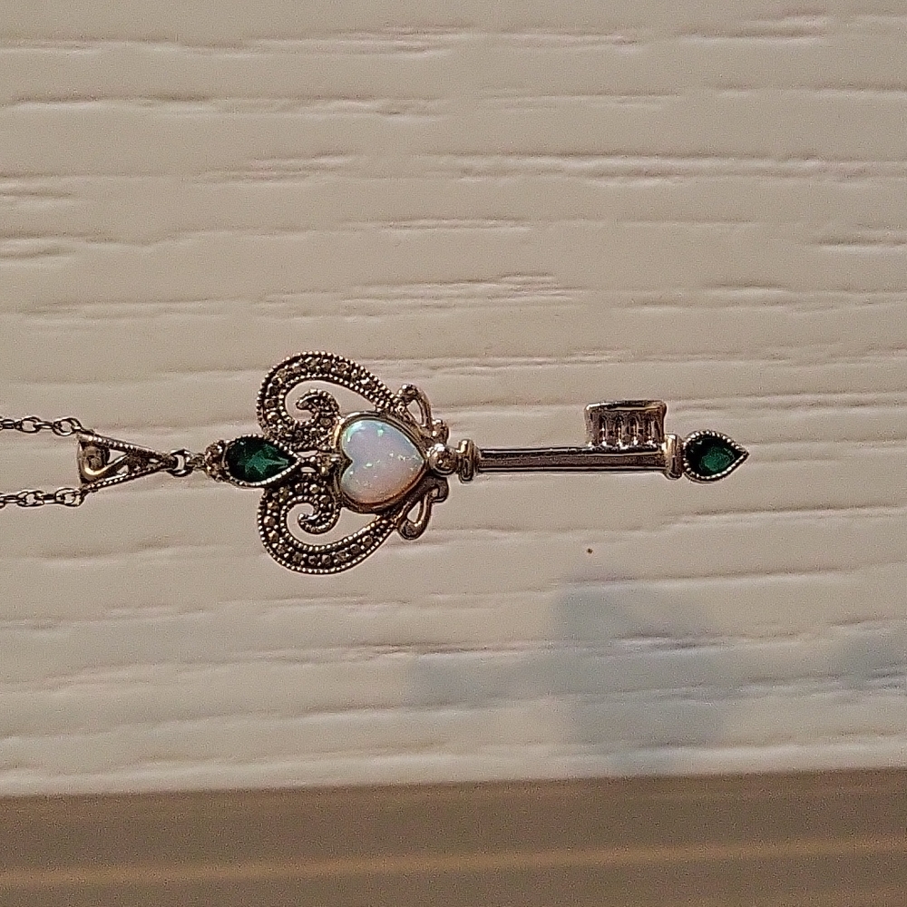 Diamond, Emerald and Ivory Key pendant
